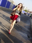 漂亮的红短裙美腿高跟少妇